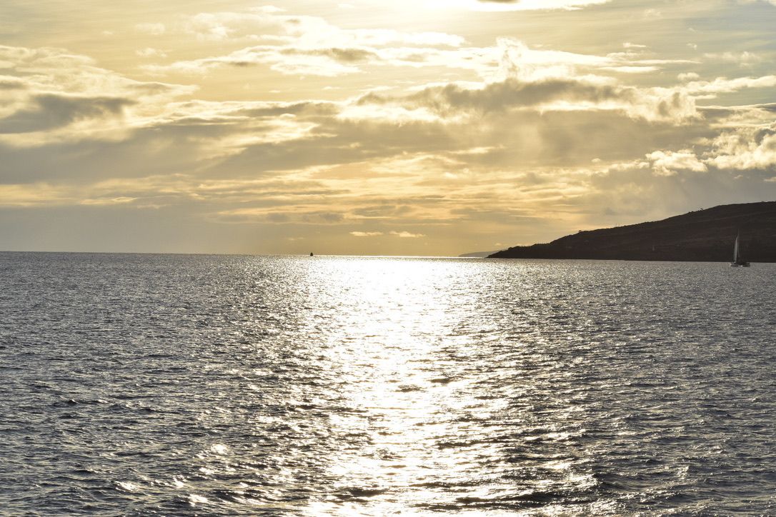 Staring out at the calm waters at sundown. Peaceful. 