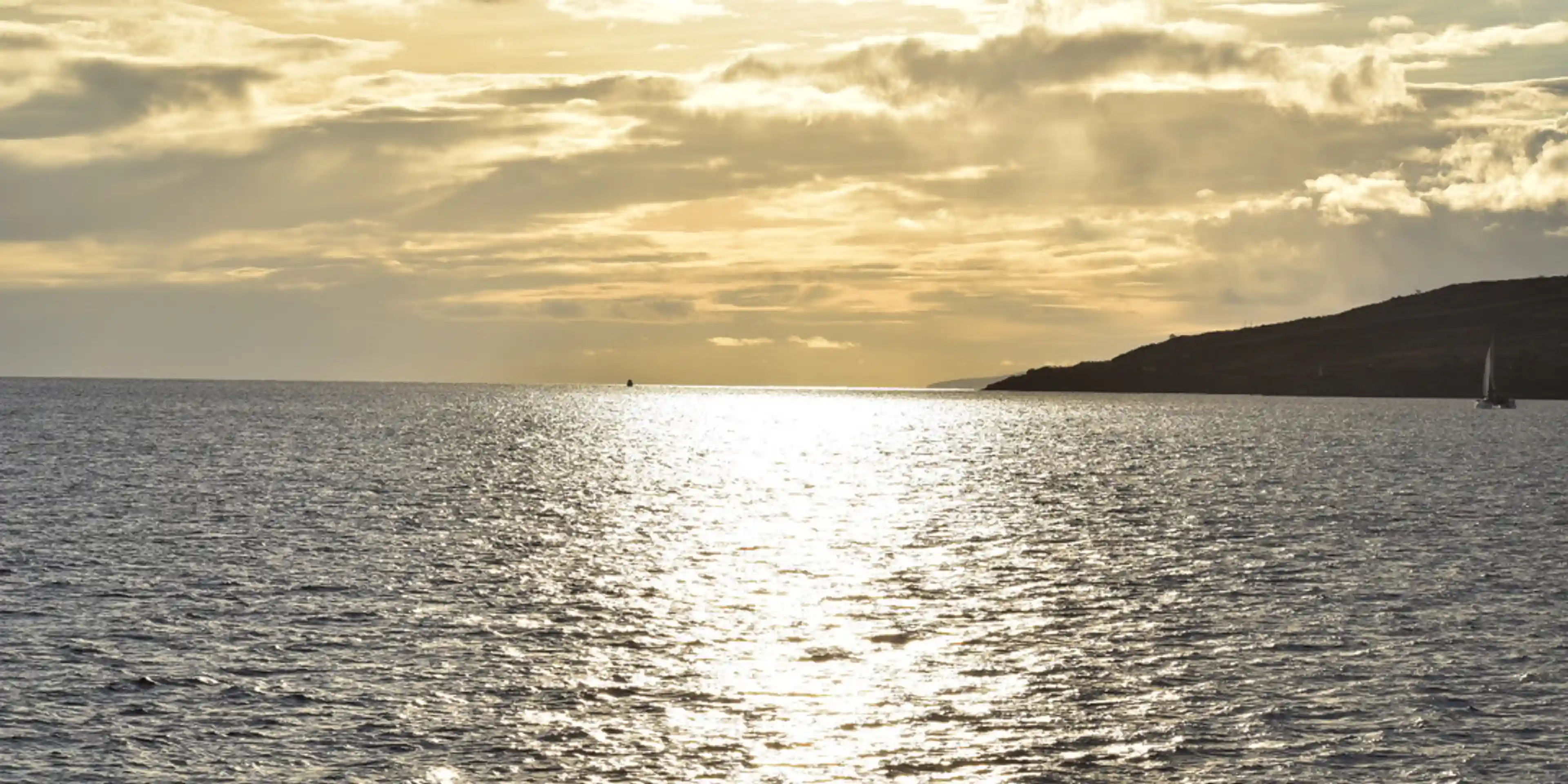 Staring out at the calm waters at sundown. Peaceful.