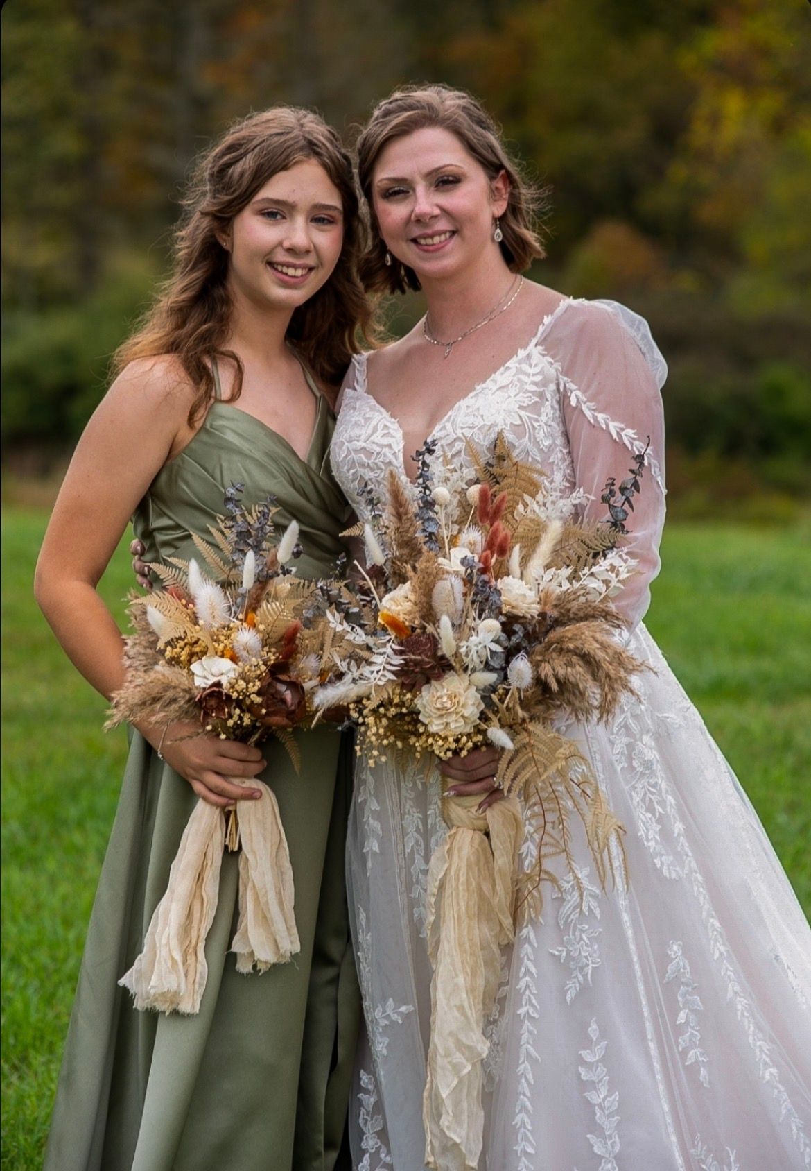 Bride and Bridesmaid: Bridesmaid dress: skirt waist taken in and hem raised 3 inches