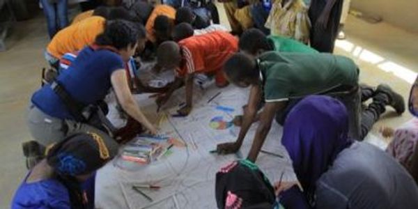 Children designing the Tree of Hope