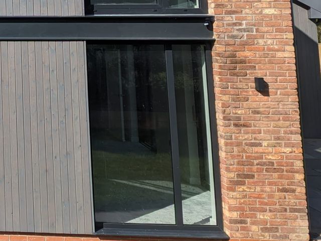 Black and grey aluminium window 1560x2290