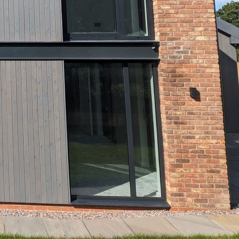 Black and grey aluminium window 1560x2290