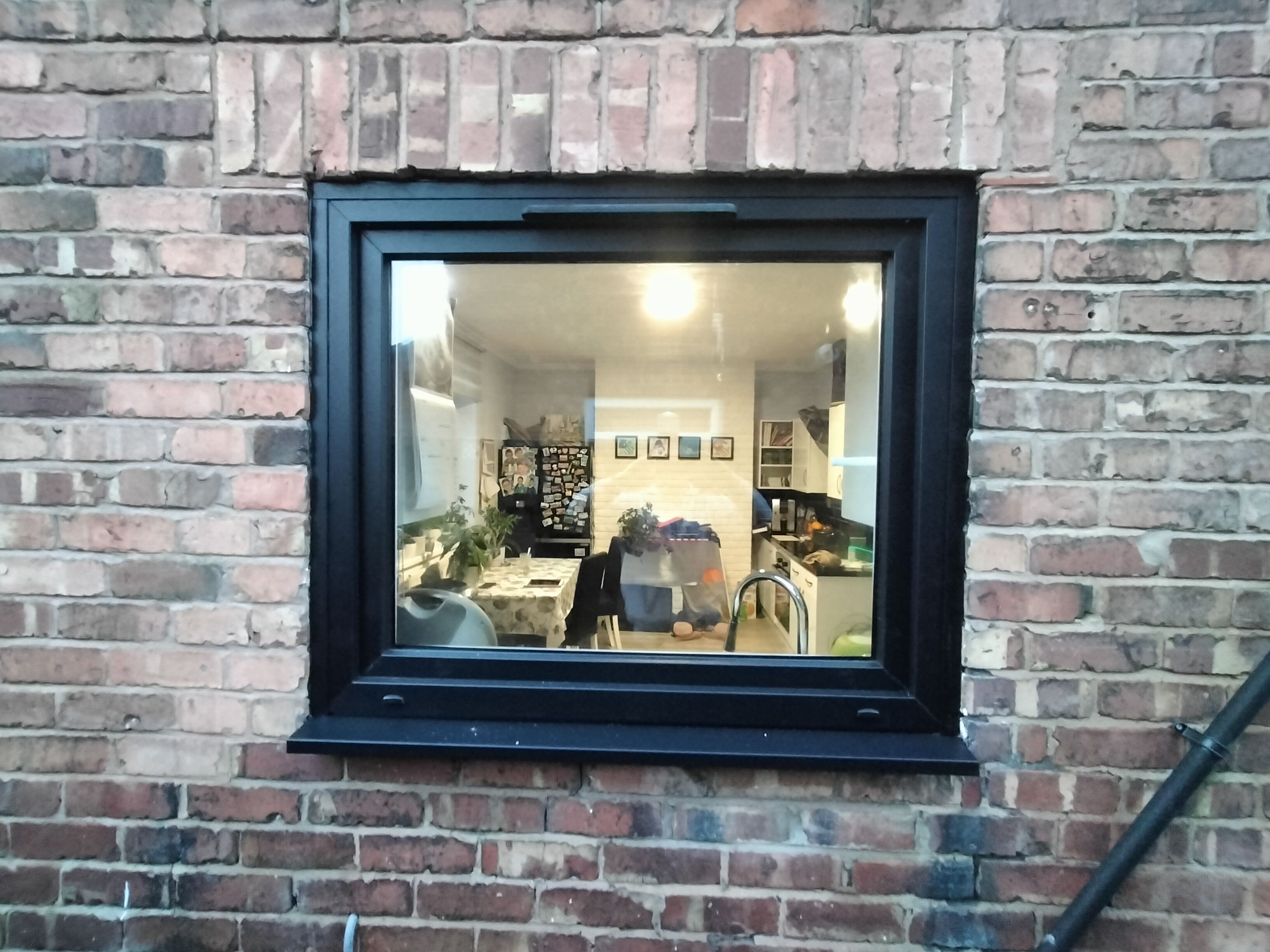 The Evolution of Modern Living in Ellesmere Port: Black Smooth Windows, Triple Glazing, and Tilt and Turn
