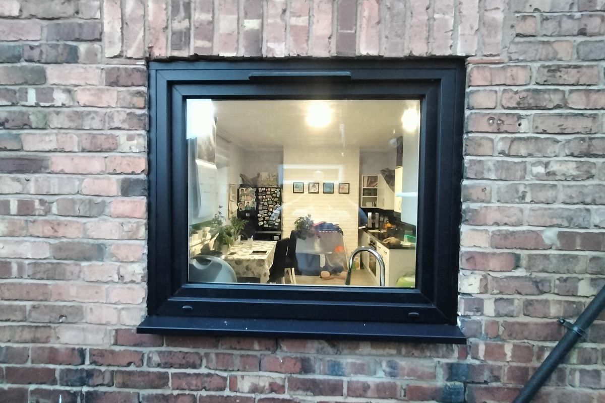 The Evolution of Modern Living in Ellesmere Port: Black Smooth Windows, Triple Glazing, and Tilt and Turn