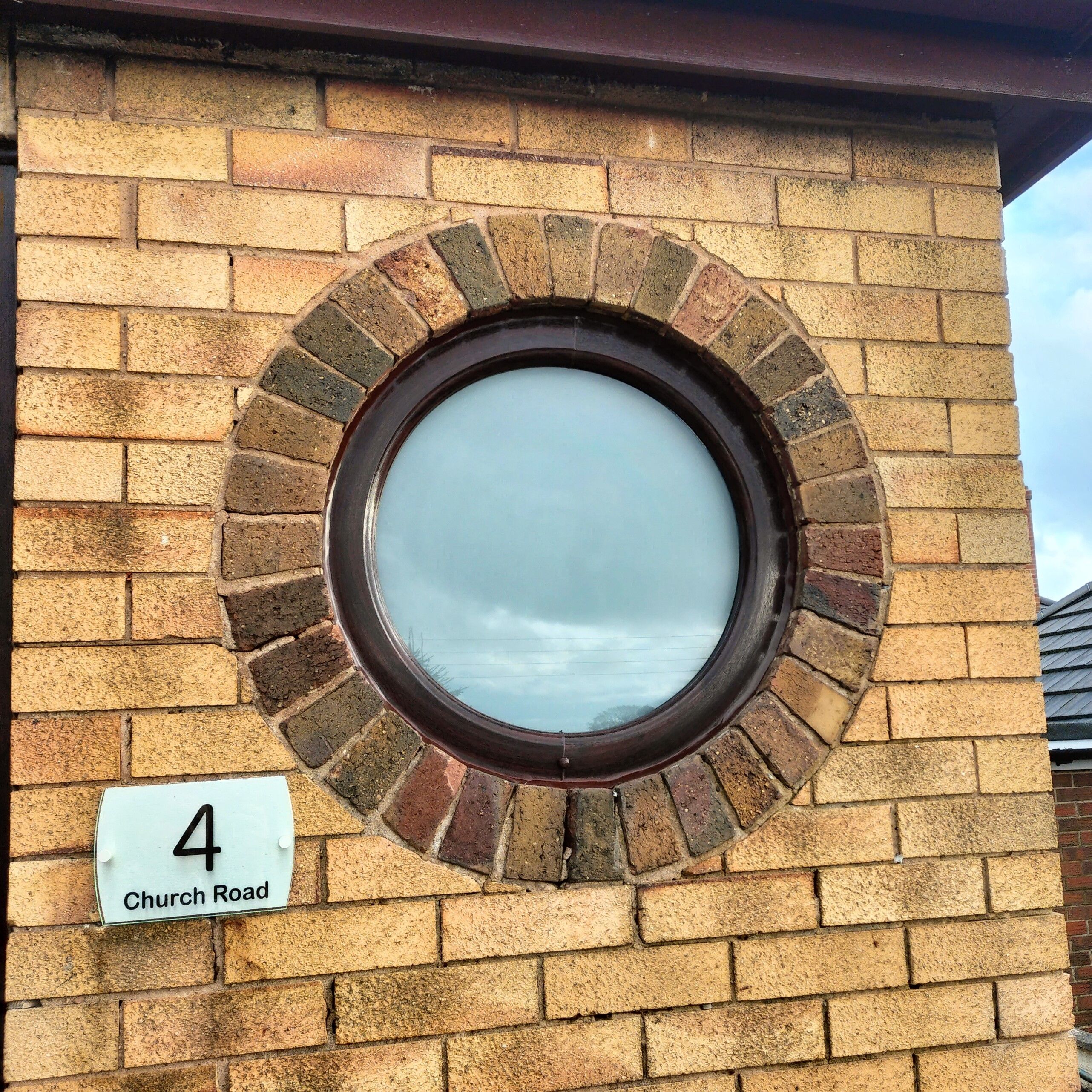 REHAU Rosewood Windows and Endurance Composite Doors Installation in Brown Edge