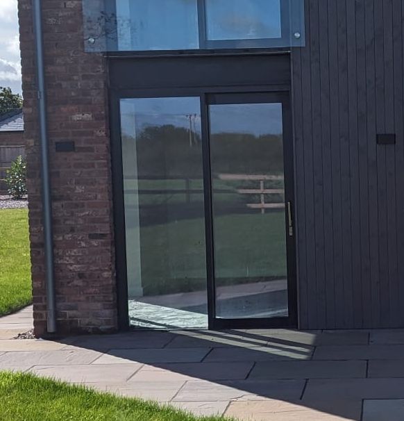 Black and grey lift-and-slide glass door 1790x2305