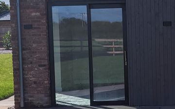 Black and grey lift-and-slide glass door 1790x2305
