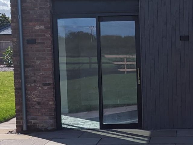 Black and grey lift-and-slide glass door 1790x2305