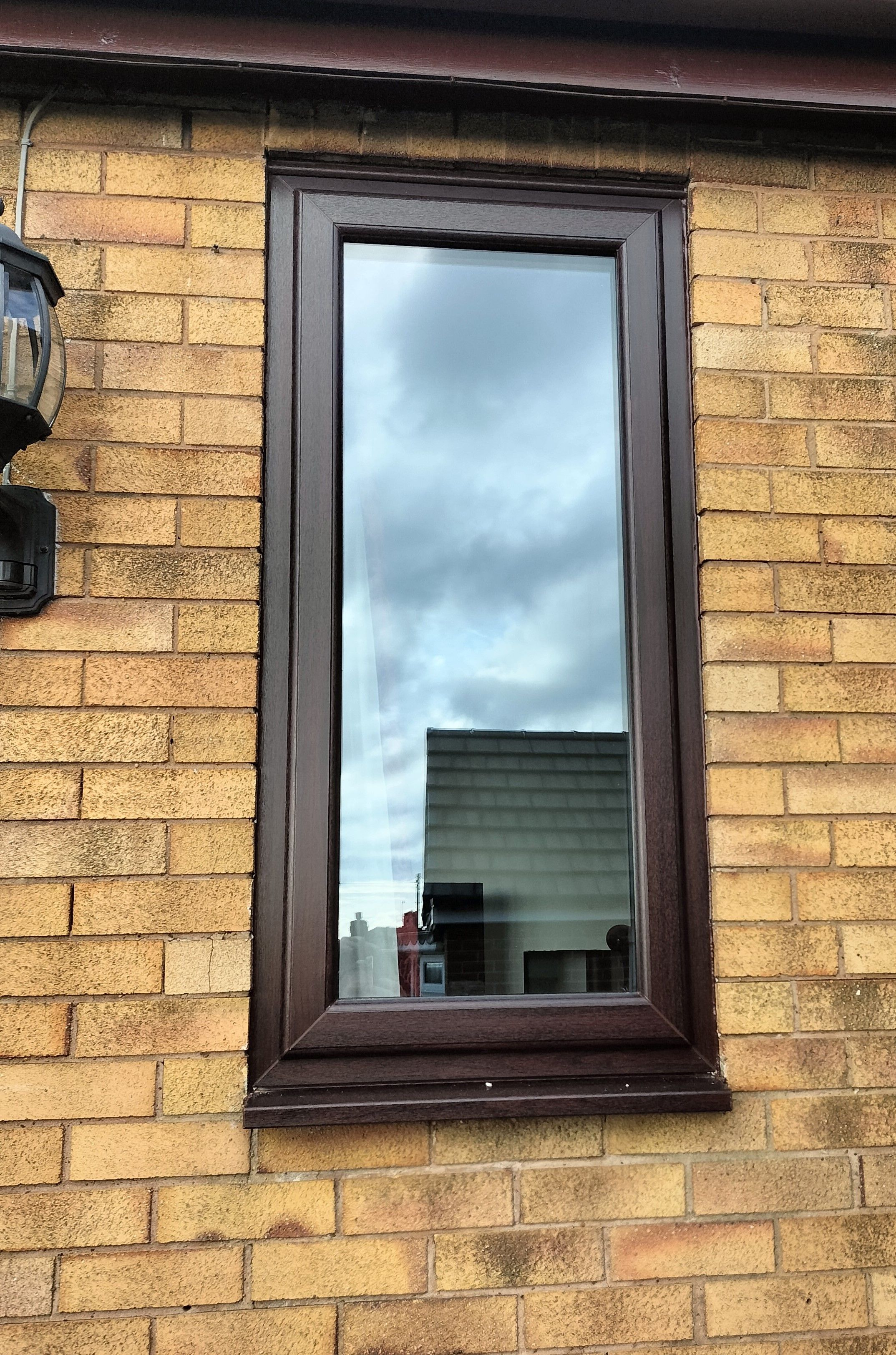 REHAU Rosewood Windows and Endurance Composite Doors Installation in Brown Edge