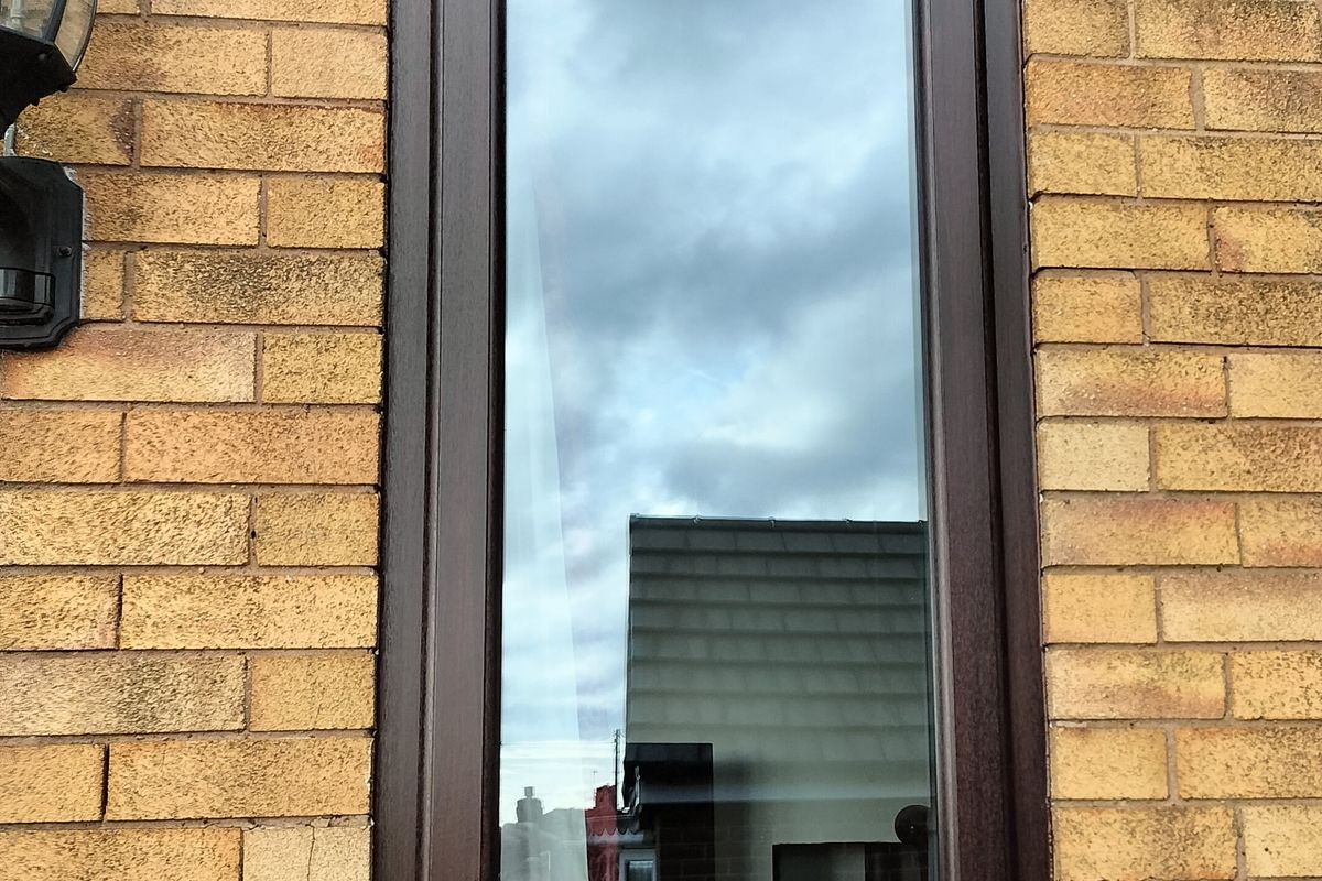 REHAU Rosewood Windows and Endurance Composite Doors Installation in Brown Edge