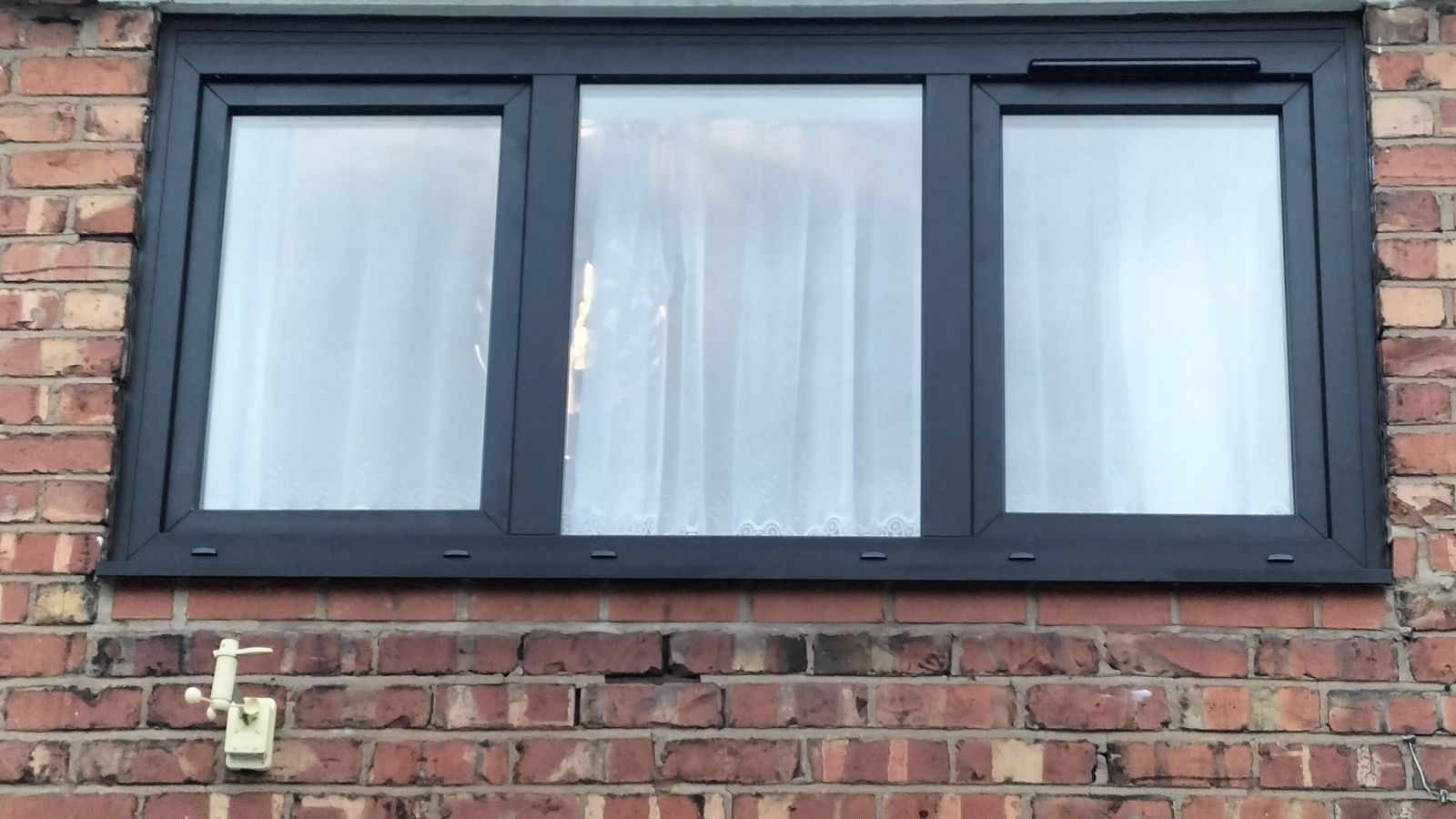 The Evolution of Modern Living in Ellesmere Port: Black Smooth Windows, Triple Glazing, and Tilt and Turn