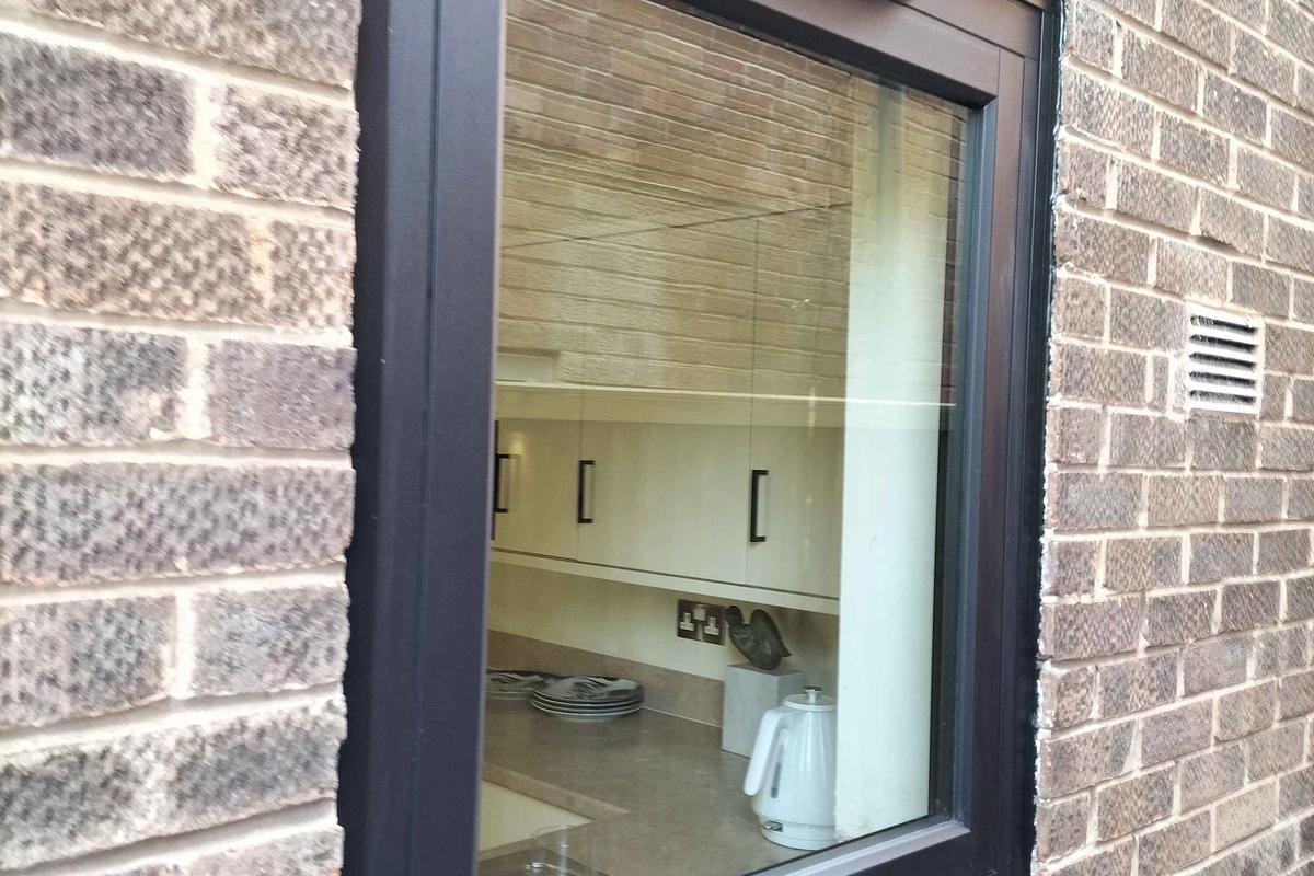 Stunning Window and Door Upgrade in Knutsford: Smooth Black and Crittall Aluminium Excellence
