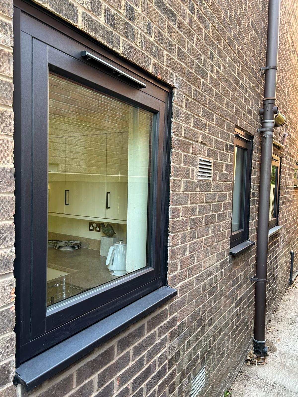 Stunning Window and Door Upgrade in Knutsford: Smooth Black and Crittall Aluminium Excellence