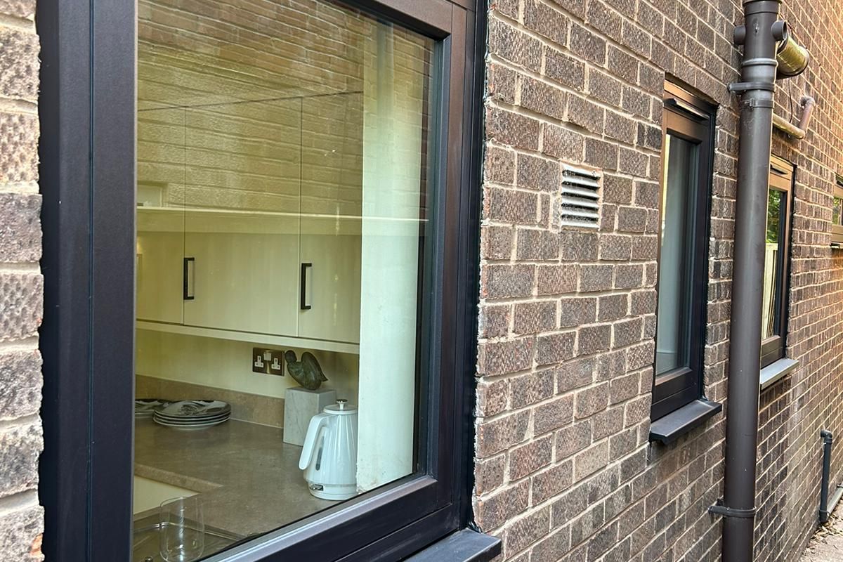 Stunning Window and Door Upgrade in Knutsford: Smooth Black and Crittall Aluminium Excellence