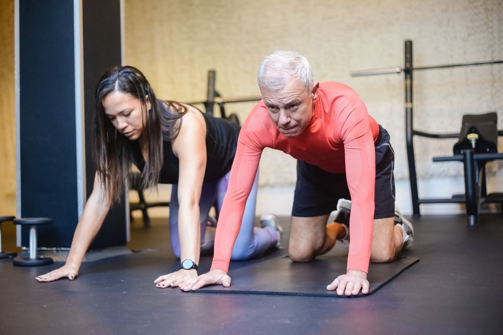 Coach-guided strength training for an adult managing joint discomfort after 40