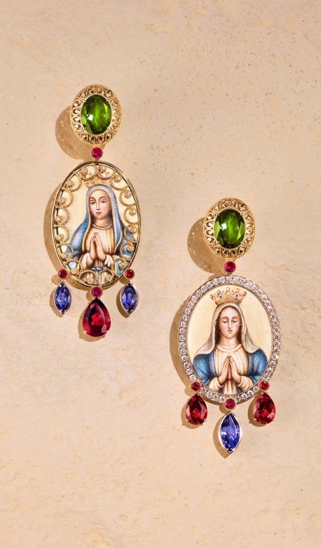 A pair of Dolce & Gabbana earrings with hand-painted miniature portraits of the Madonna, set beneath peridots and hung with rubellite and tanzanite drops.
