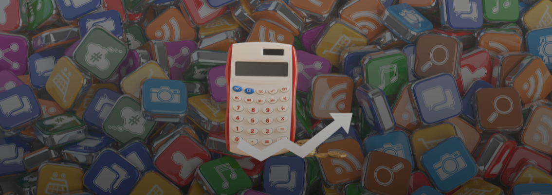 A calculator on a pile of app icons, symbolizing the rising cost of digital subscriptions that requires smart calculation.