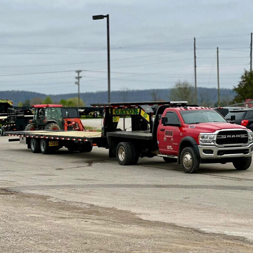 red-ram-truck-with-flatbed-trailer-for-hauling