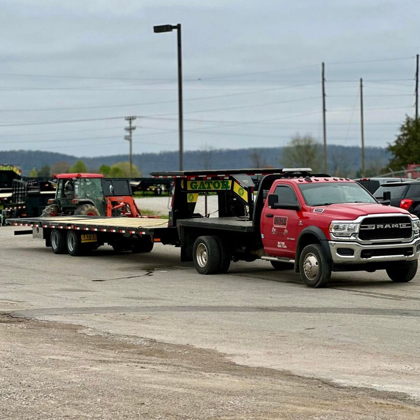 red-ram-truck-with-flatbed-trailer-for-hauling