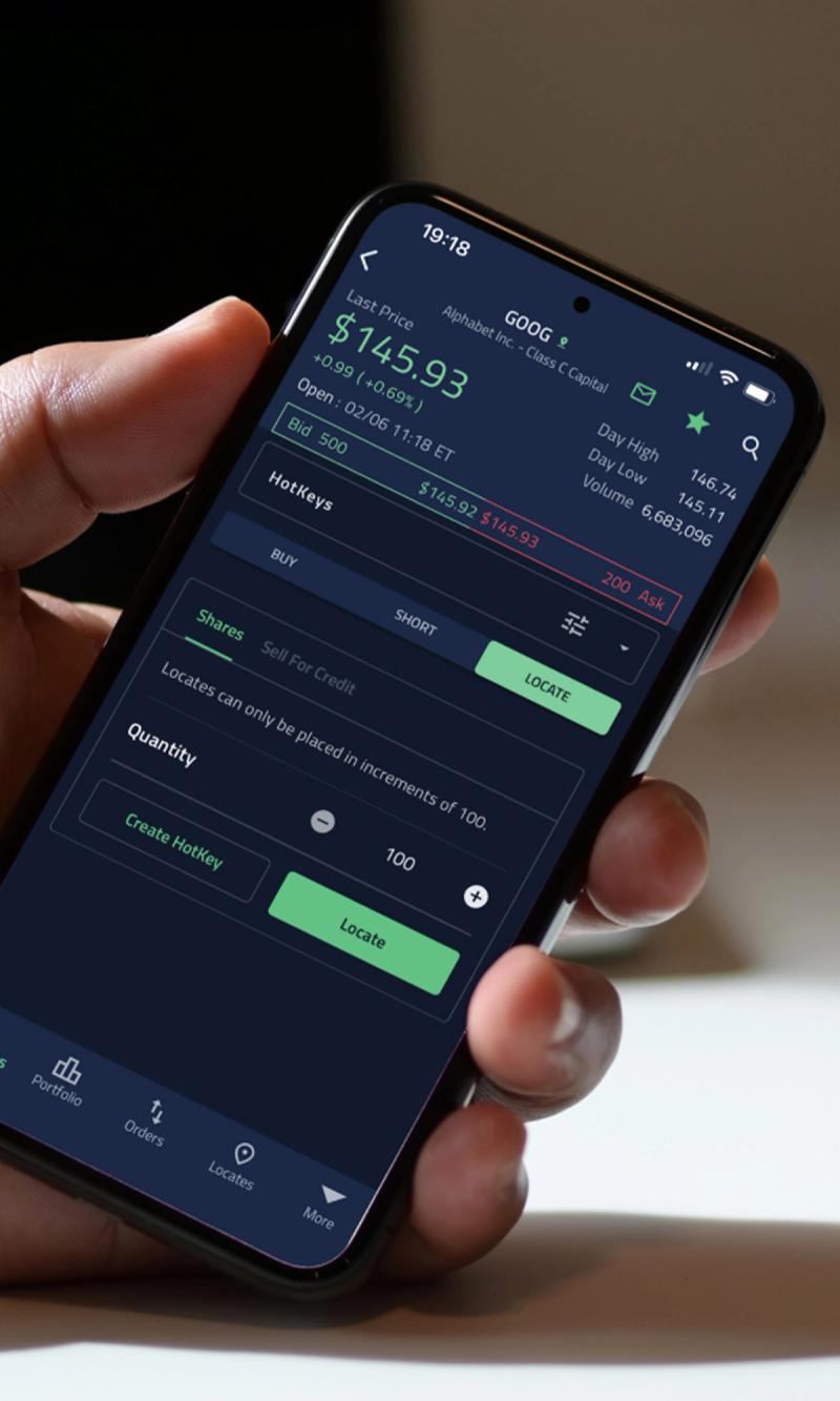Hand of a man holding a mobile phone that shows the ZeroMobile app