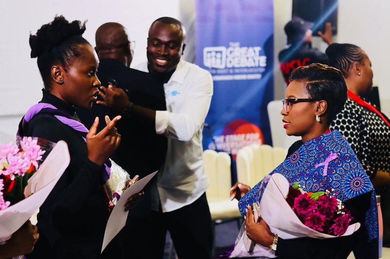 Getting her flowers from MS Mbewe of Mbewe Attorneys.