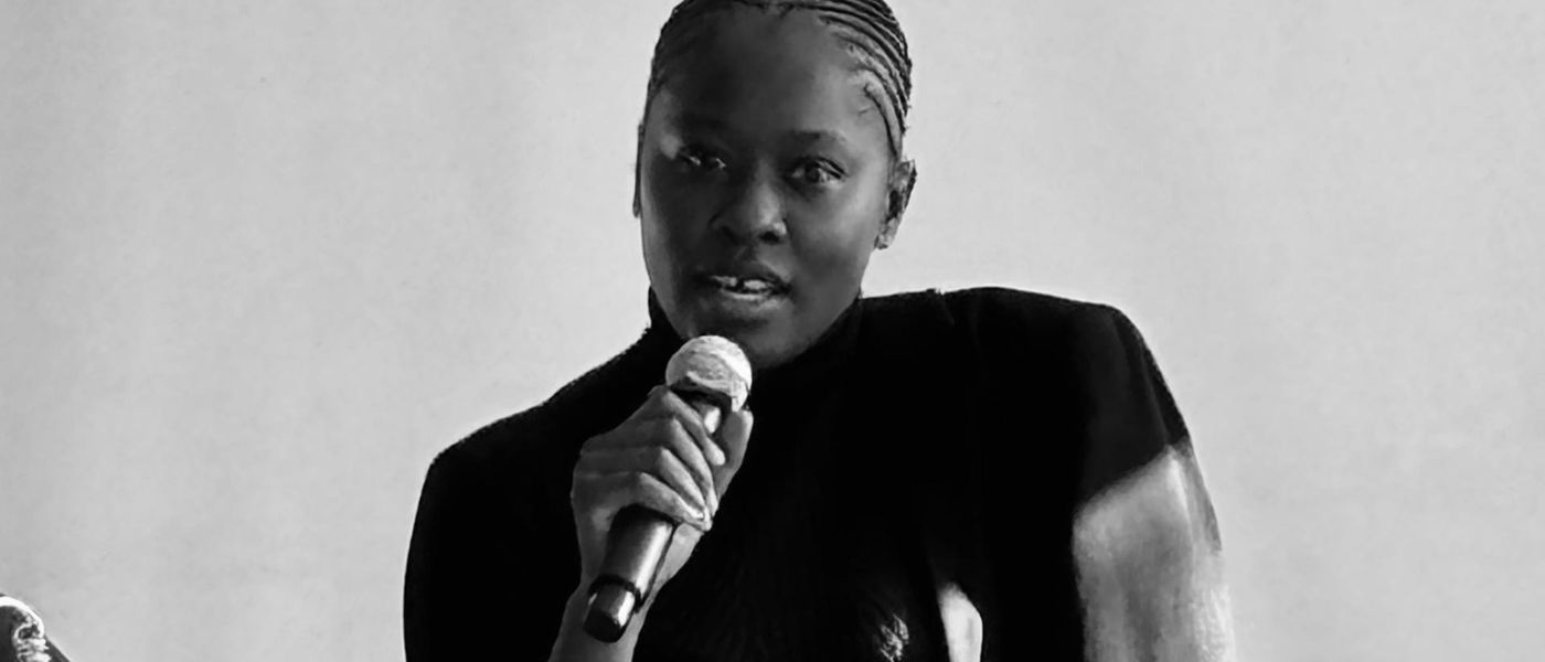 Addressing youth at Molapo crossing about silence in abusive relationships.