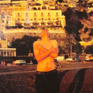 Nan Goldin: Pawel on the beach Laughing, Positano