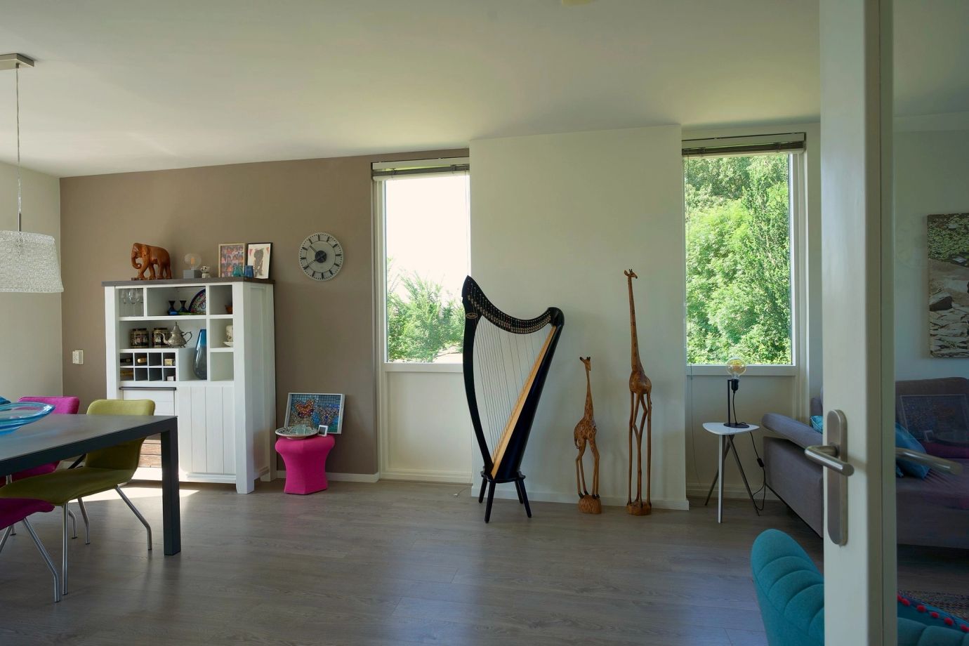 Living room with a harp and large window