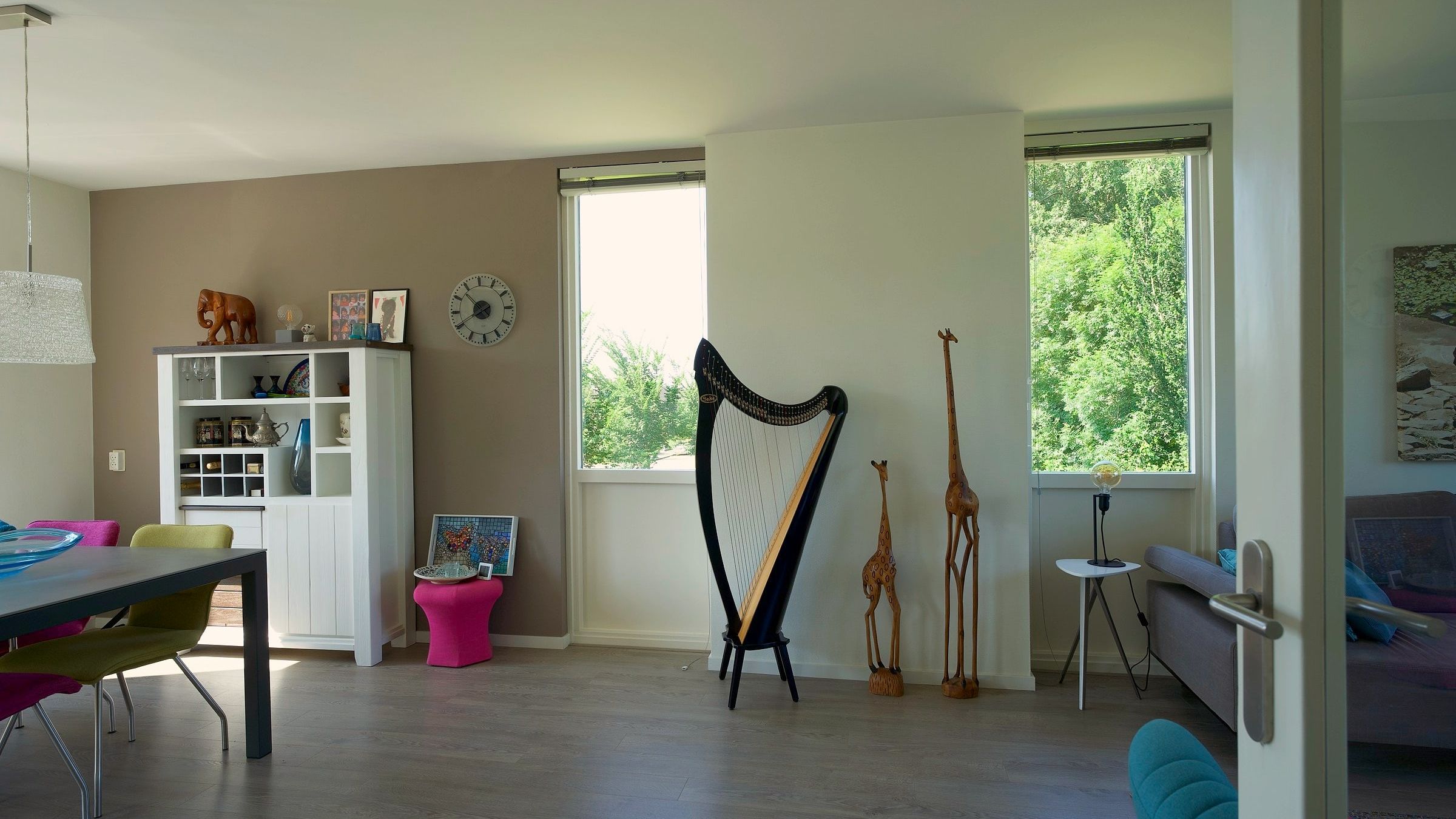 Living room with a harp and large window