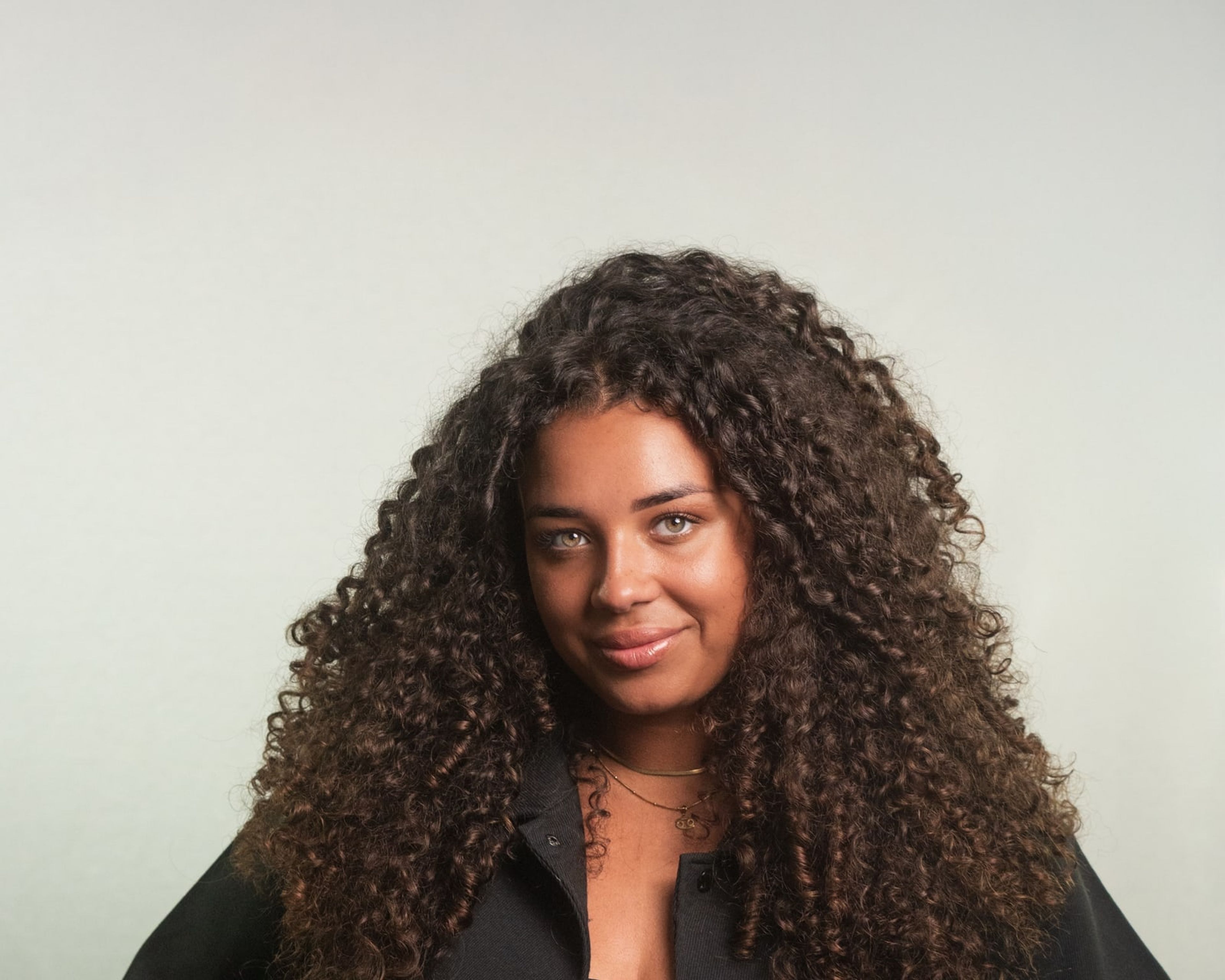 Confident portrait with hands on hips