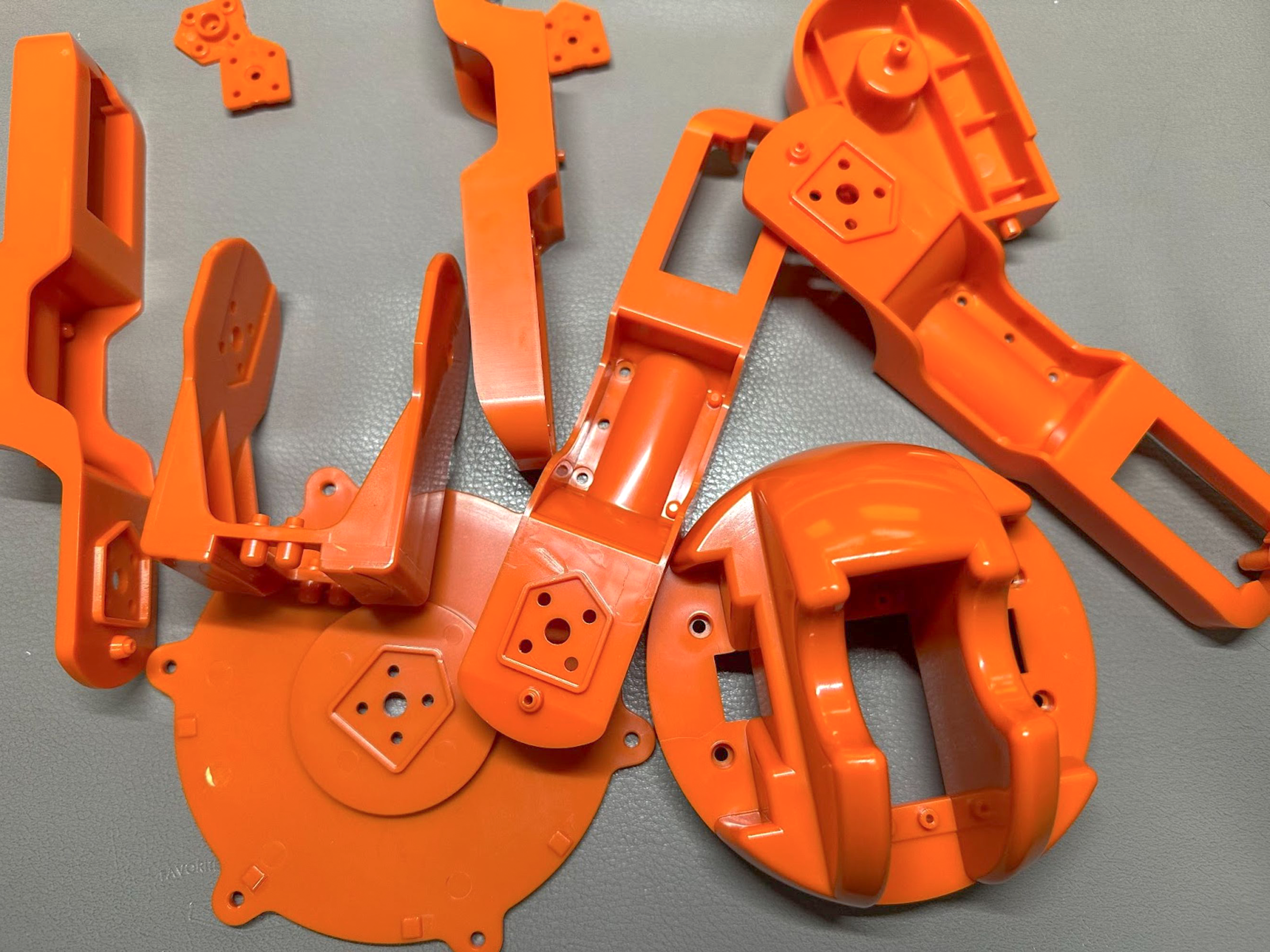 orange colored robot arm