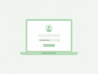 A laptop screen showing a sign-in form with a user avatar, an email field and a filled password field.