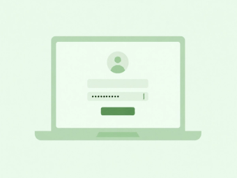 A laptop screen showing a sign-in form with a user avatar, an email field and a filled password field.