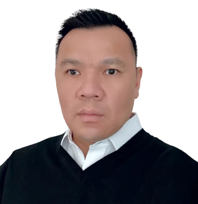 A man is wearing a black sweater and a white shirt