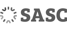 A black and white sasc logo on a black background
