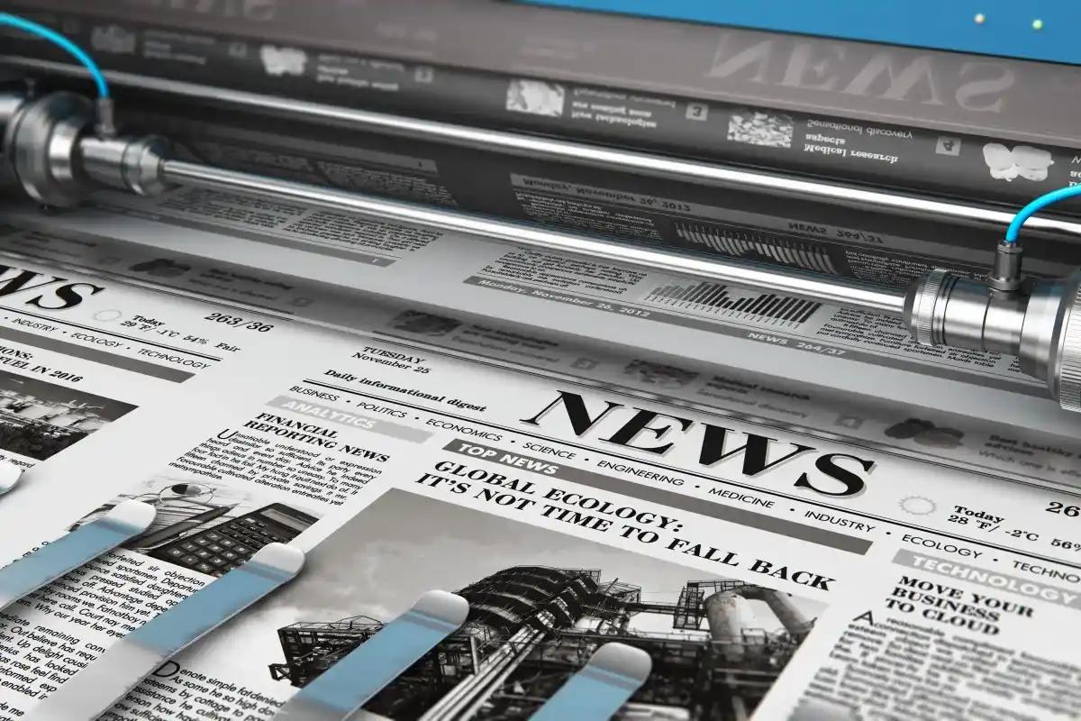 Un gros plan dun journal en train dtre imprim sur une machine