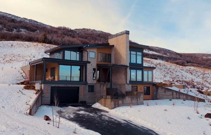 Benloch Ranch Lot 112 modern mountain home winter exterior aerial view Heber City Utah