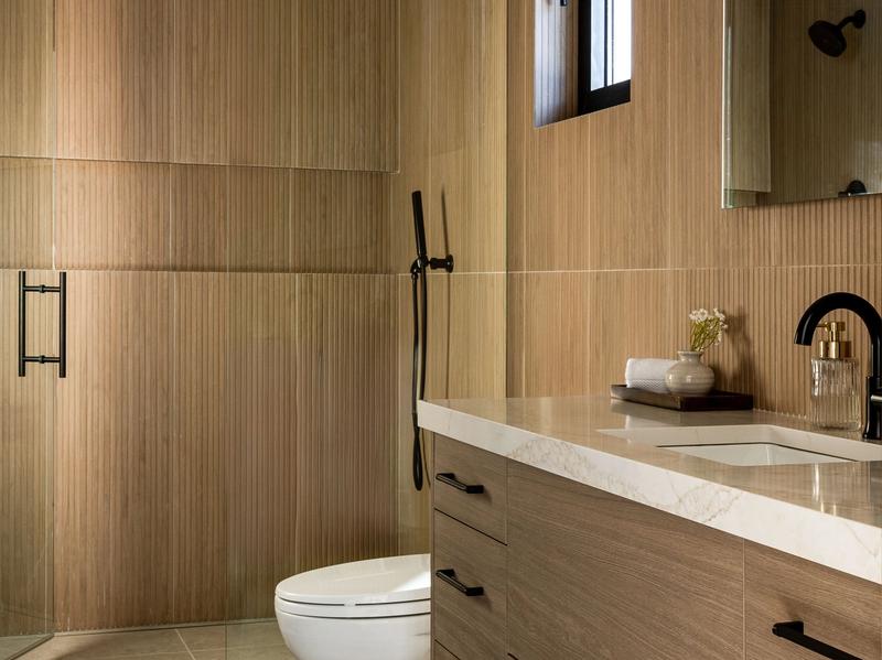 custom home horizontal wood paneling accent wall modern mountain interior design Benloch Ranch
