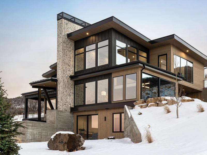 mountain modern home exterior side elevation stone wood architecture Benloch Ranch Heber City Utah