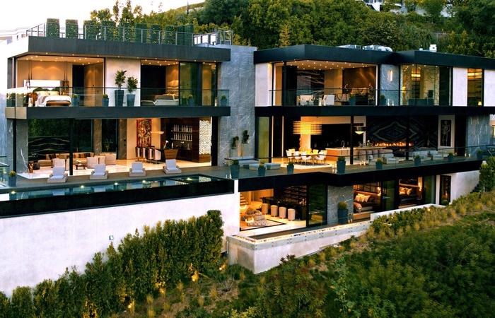 Thrasher Avenue luxury modern estate exterior at twilight in the Bird Streets Los Angeles