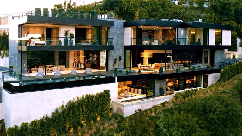 Thrasher Avenue luxury modern estate exterior at twilight in the Bird Streets Los Angeles