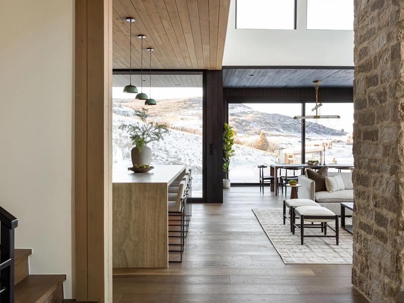 mountain modern living room fireplace floor-to-ceiling windows Benloch Ranch panoramic Wasatch views