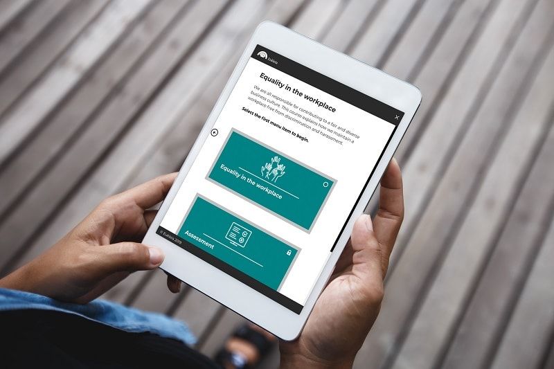 A photo of compliance eLearning on a tablet. This course is responsive and adaptive, displaying perfectly on multiple devices