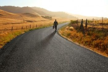 Man walking on a road