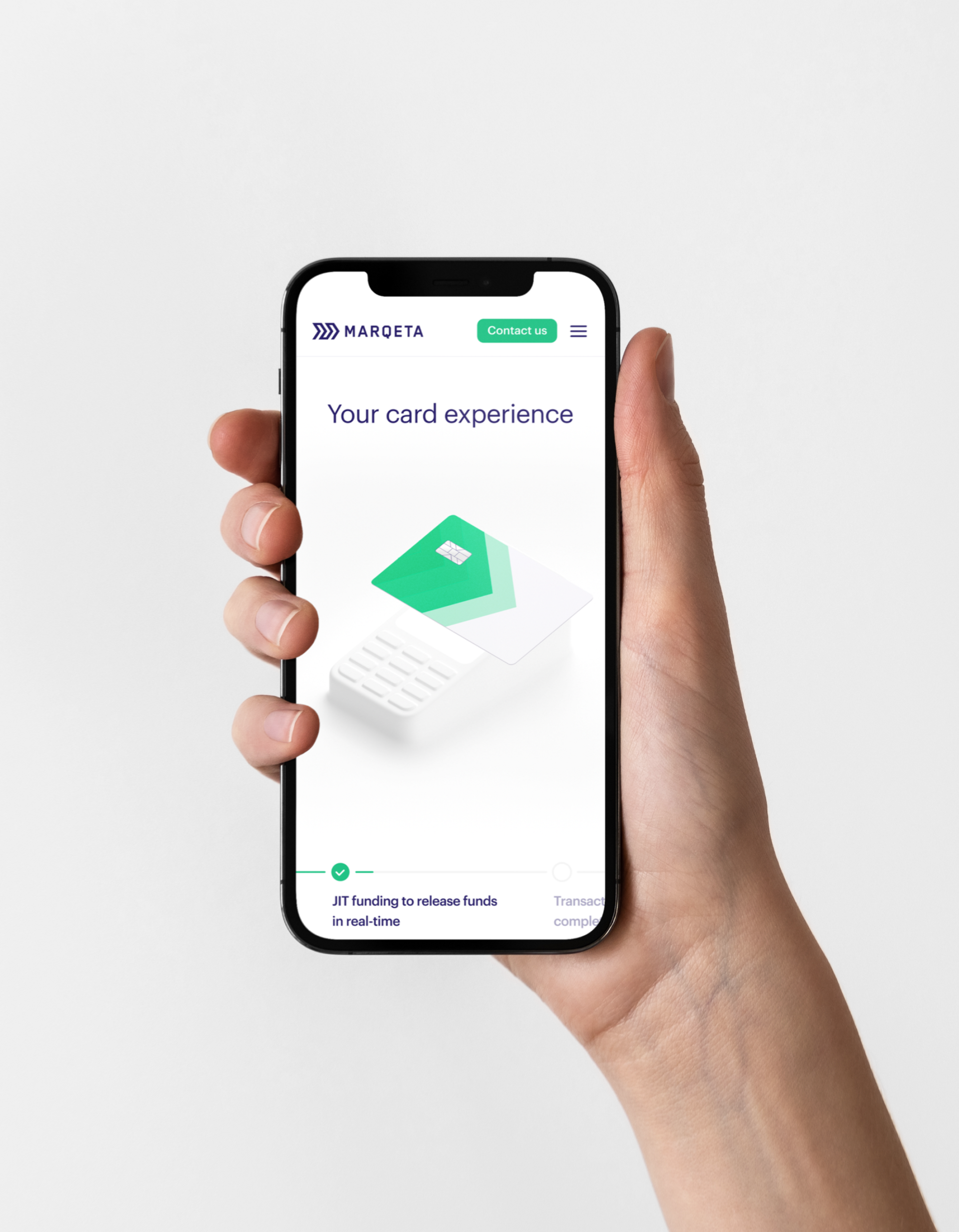 a hand holding a phone with the Marqeta app homescreen