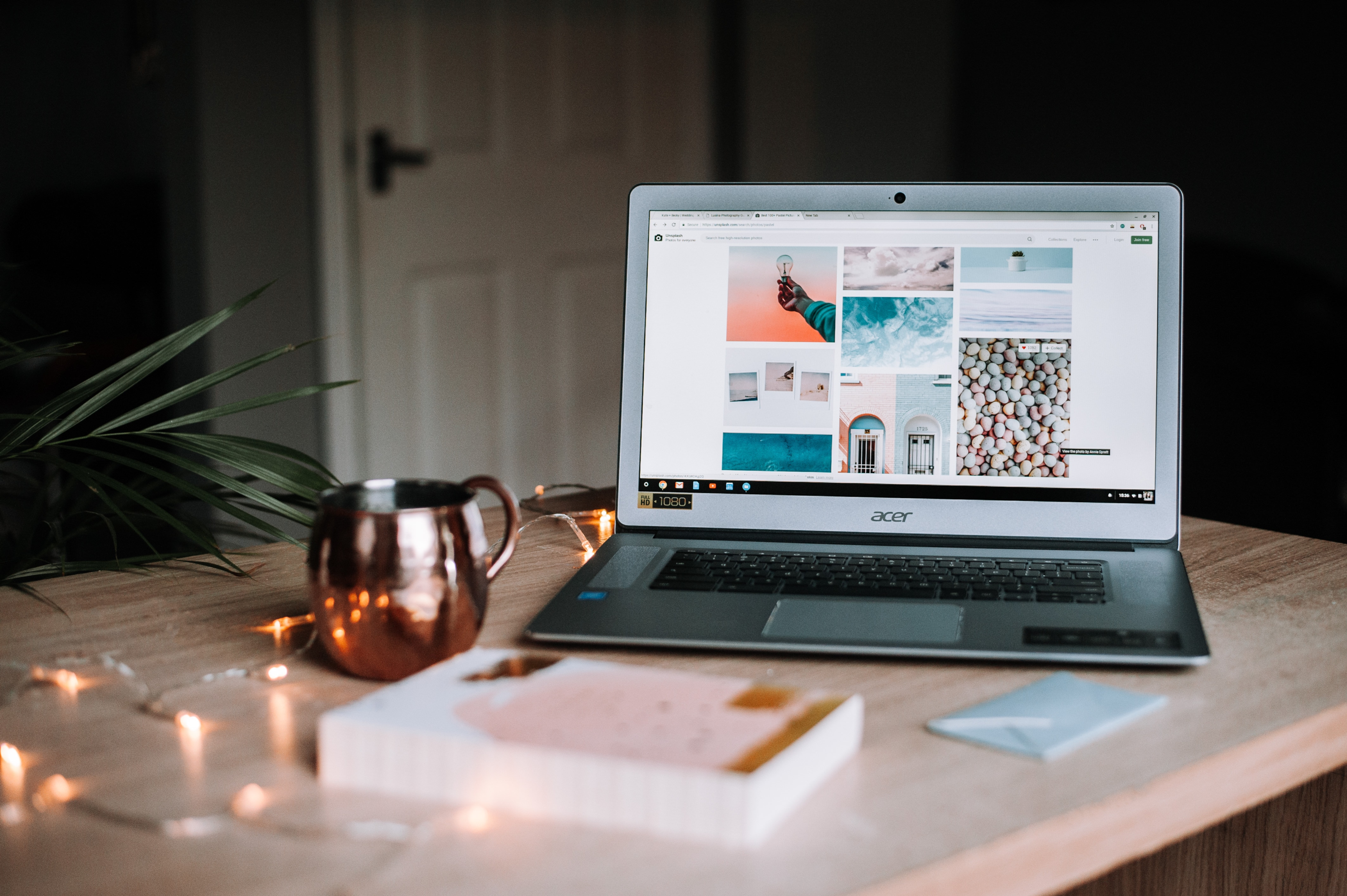 A laptop and a mug