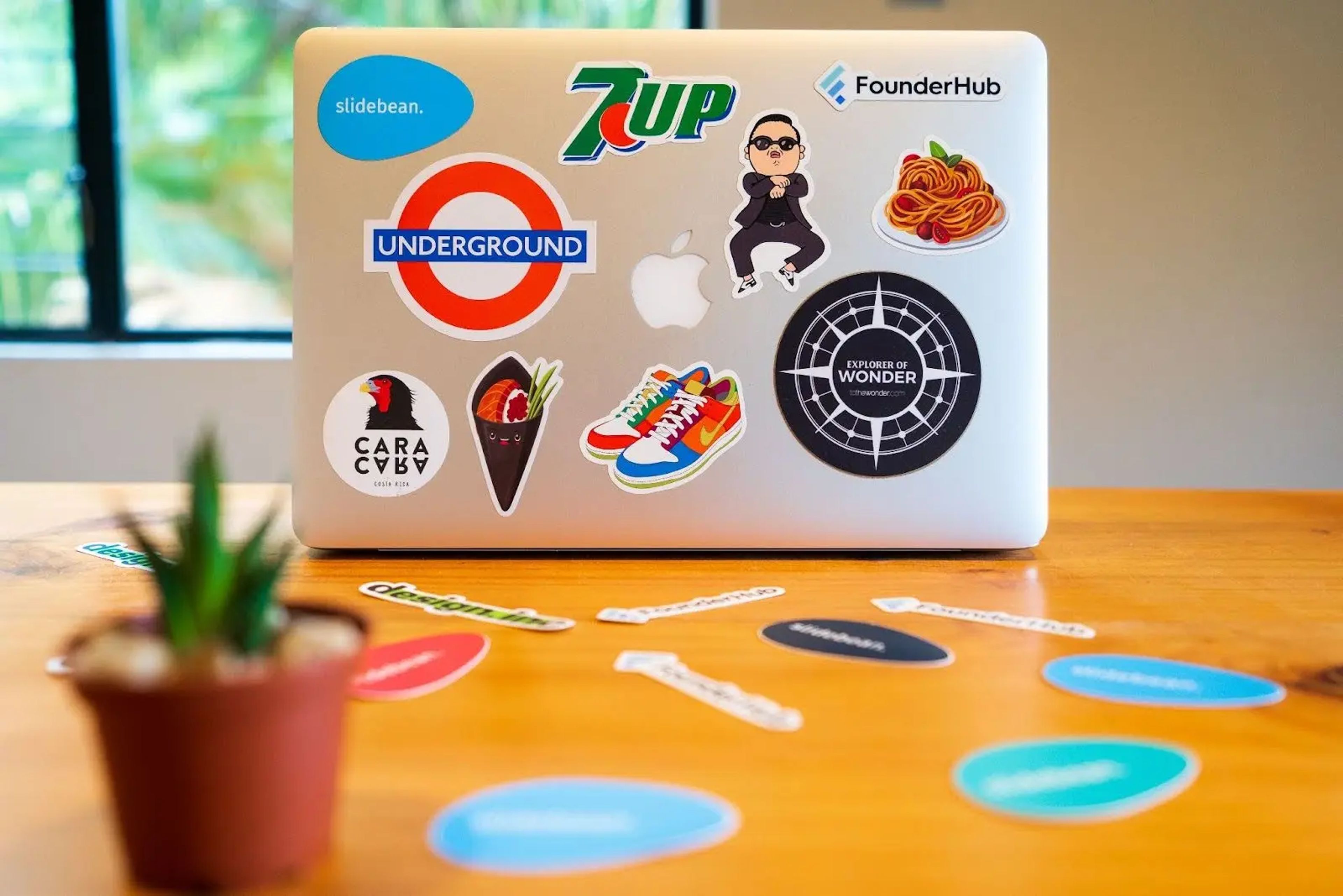 a laptop with stickers