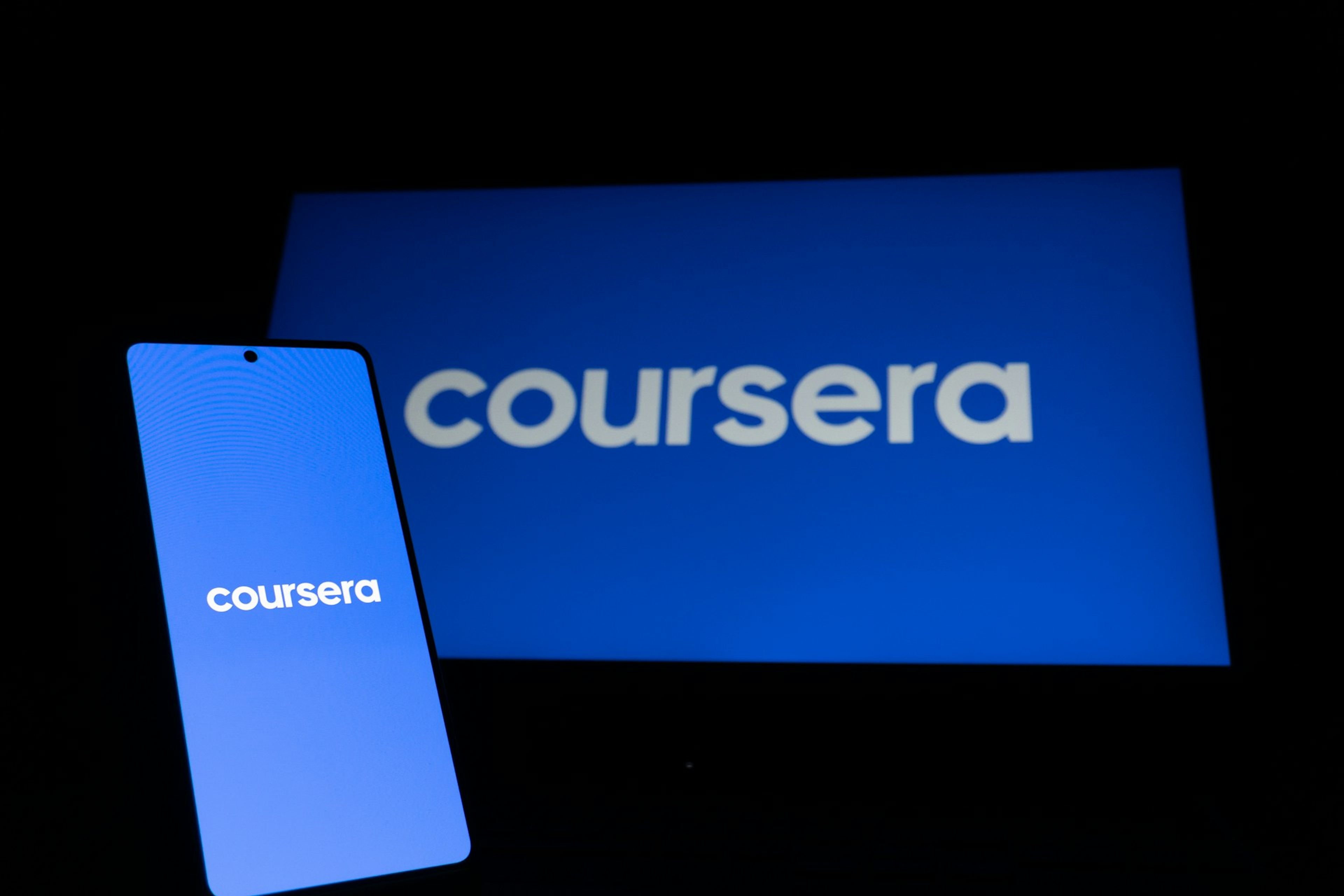 Coursera on phone and laptop screen