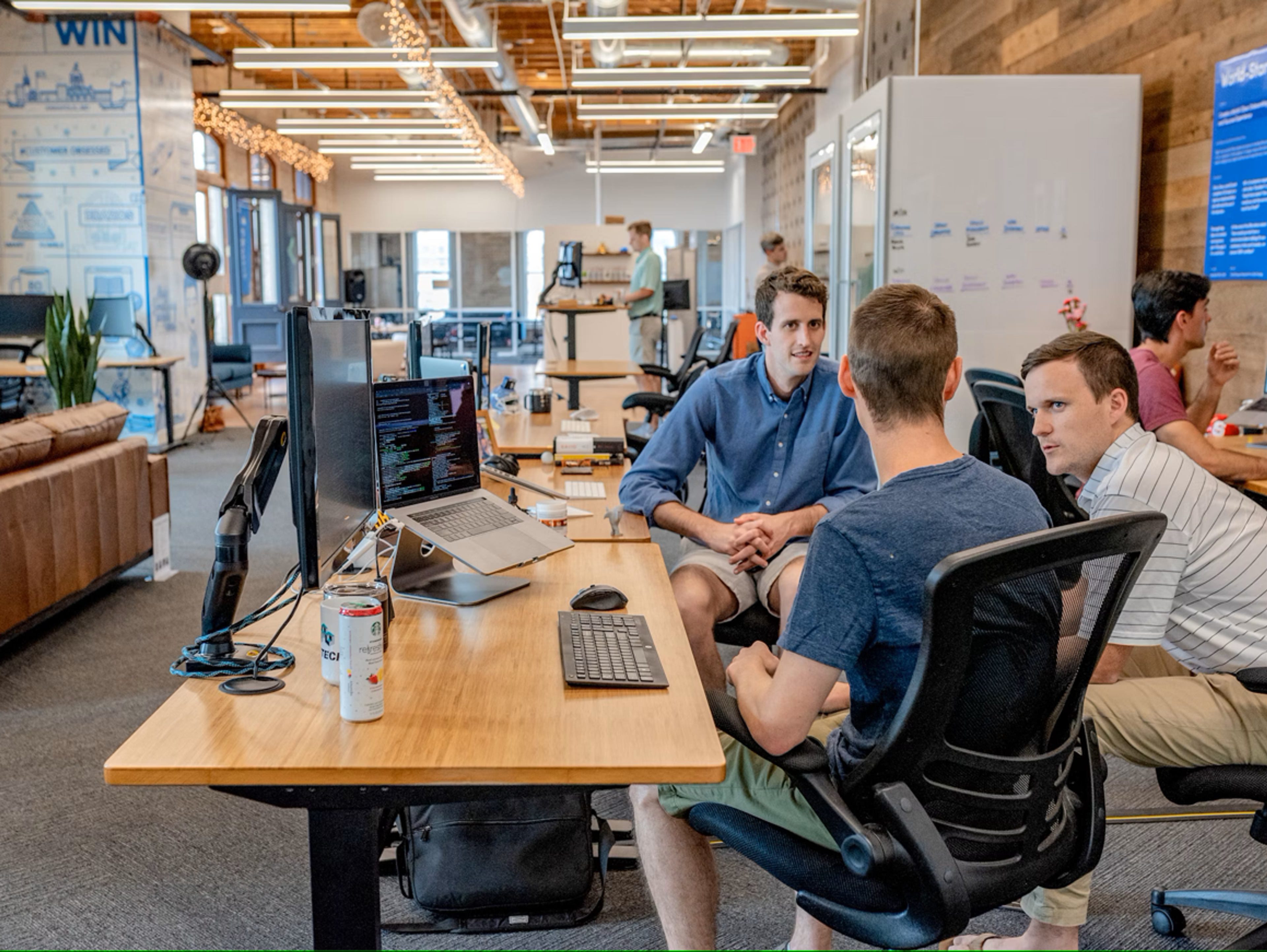 group of people sitting in an office