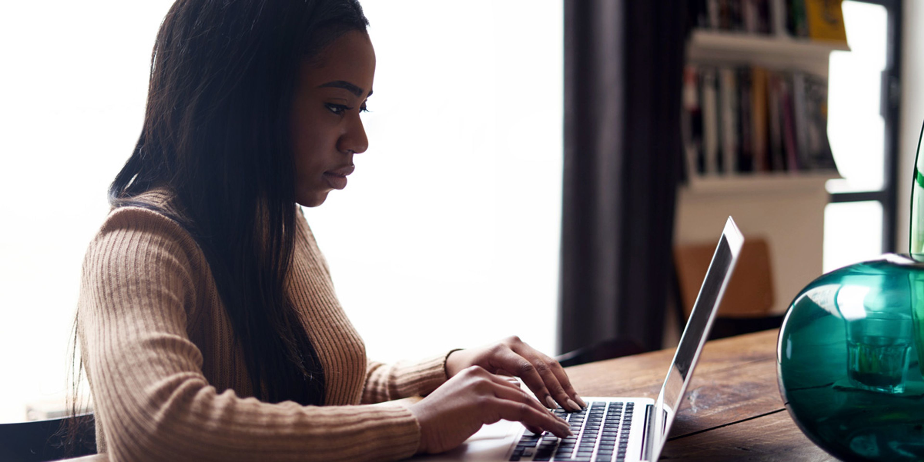 UX designer working at her laptop